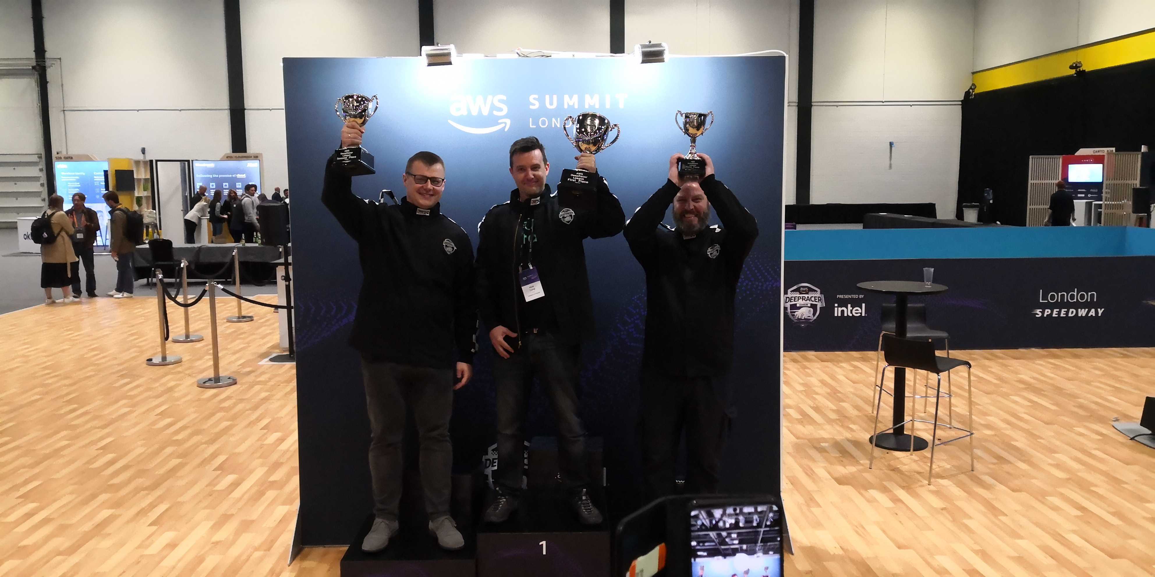 Matt Camp in first, Tomasz Ptak in second and Adam Pye in third at the AWS Summit London 2022